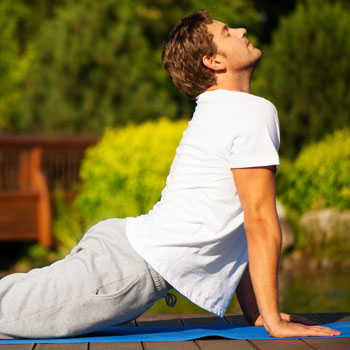 Man In Cobra Yoga Pose