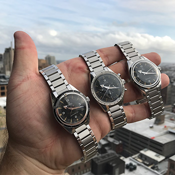 Omega 1957 Trilogy Watches Displayed On Hand