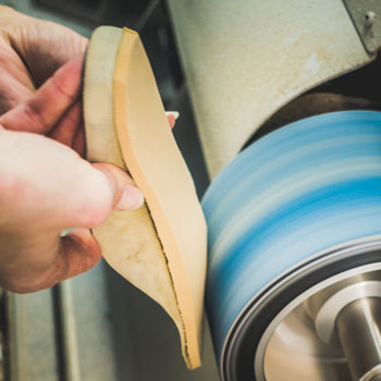 Orthotic Insole Being Sanded In Workshop