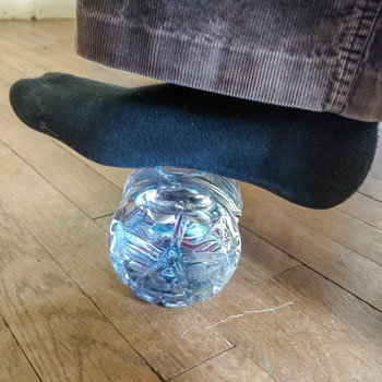 Rolling Bottle Under Foot