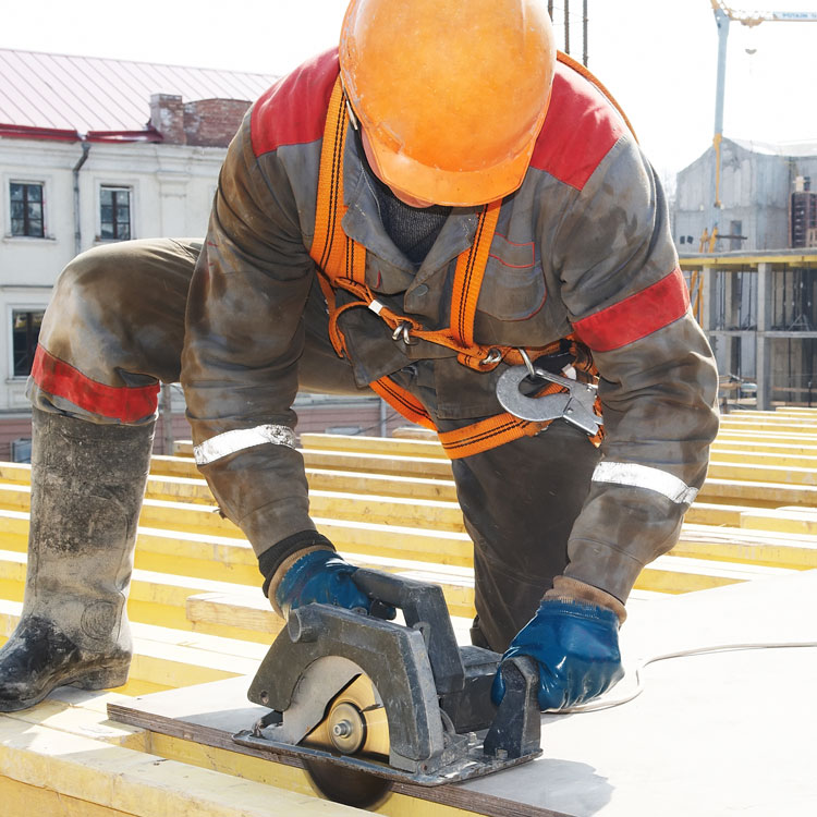 Builder Operating Circular Saw Roofing