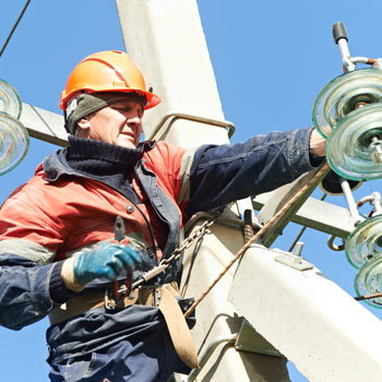 Electrician Working On Power Line