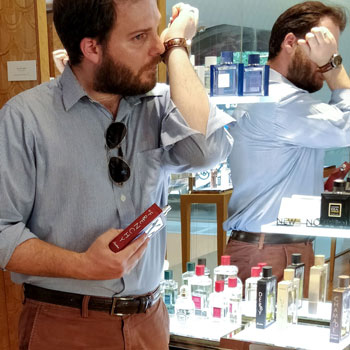 Man Testing Fragrance At Guerlain Champs Elysées Store