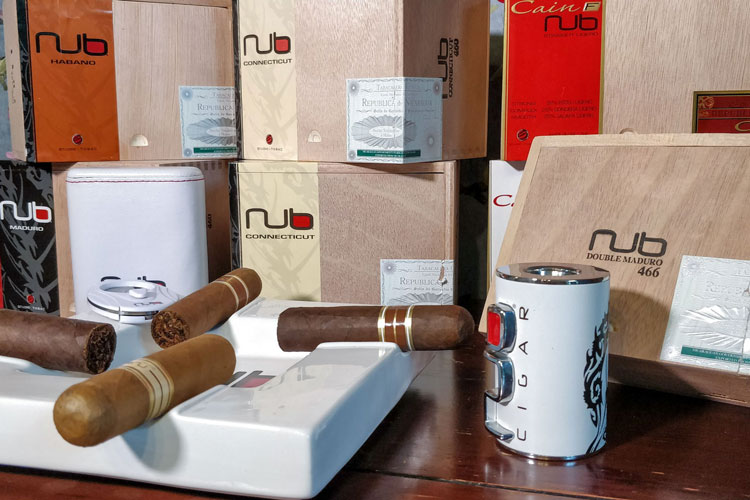 Close Up Of Various Nub Cigars & Products