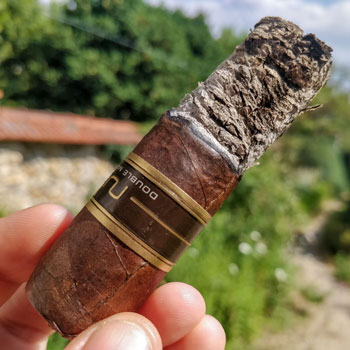 Nub Double Maduro Cigar Being Smoked