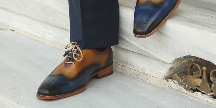 model wearing maglieriapelle ortakoy premium wholecut shoes in blue