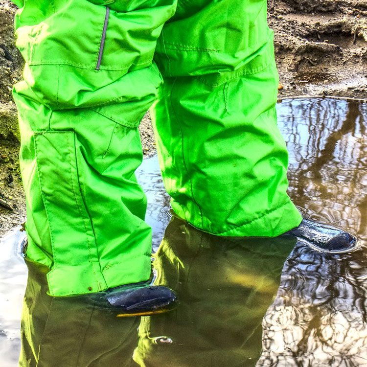 worker boots in puddle