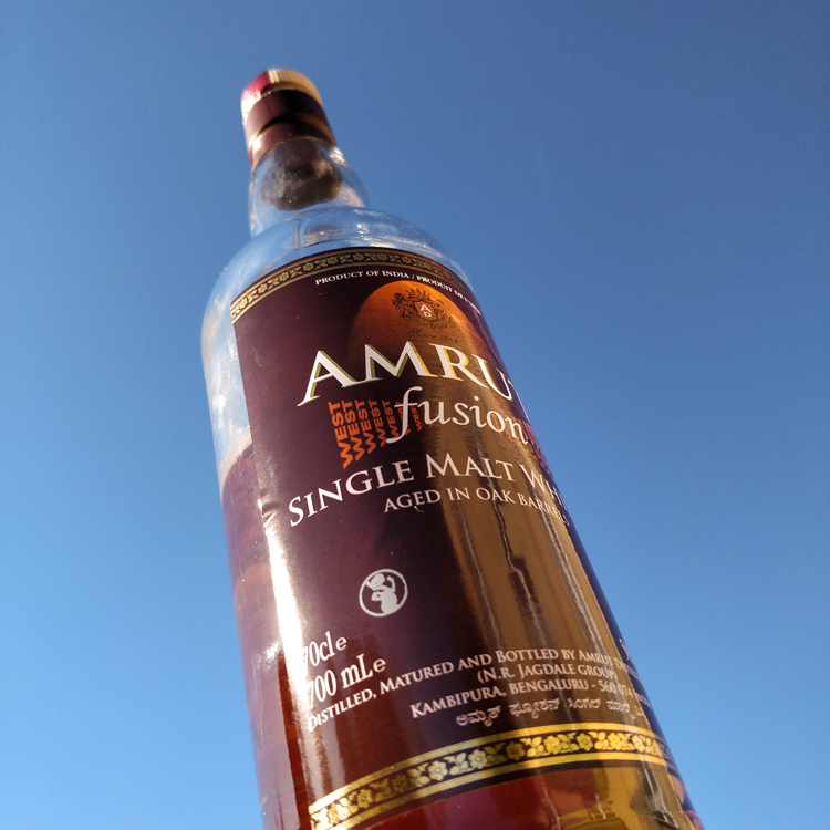 Amrut Fusion Single Malt Indian Whisky Bottle Sky Background