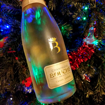 Champagne Bouché Cuvée Saphir In Front Of Christmas Tree