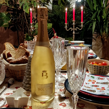 Champagne Bouché Cuvée Saphir On Candlit Table
