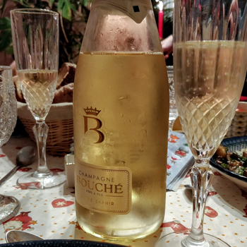 Champagne Bouché Cuvée Saphir Served In Flutes