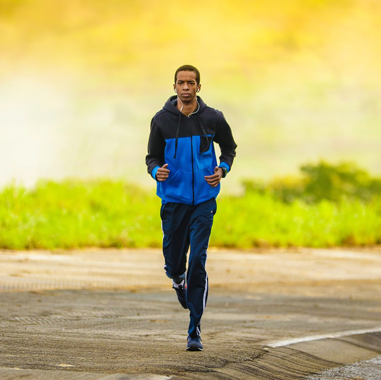 Man Running Along Road