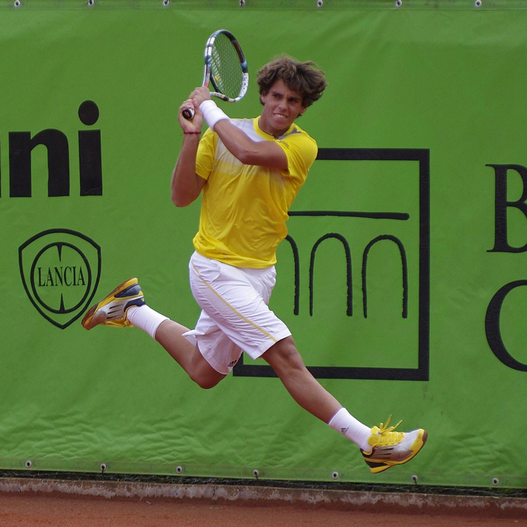 Tennis Player Leaping In Air