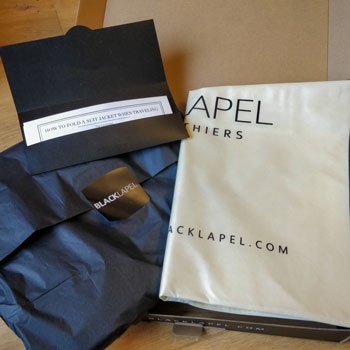 Black Lapel Delivery Packaging Unboxed