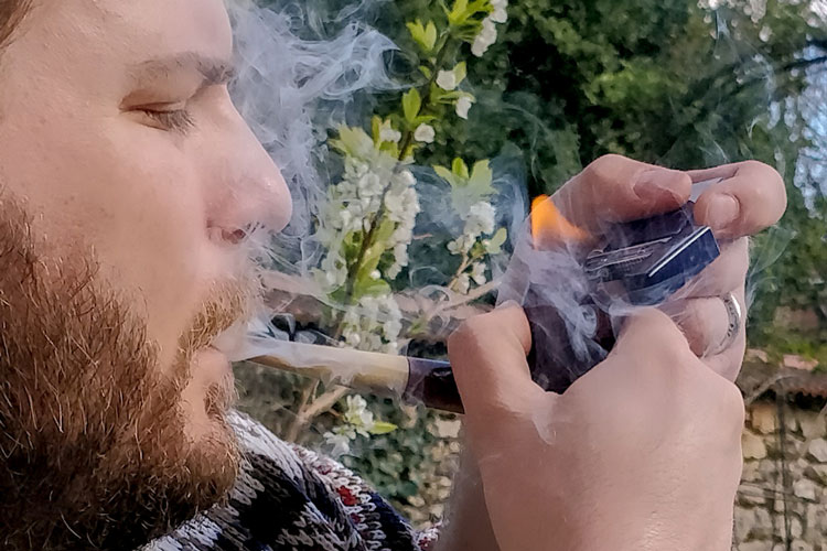 Lighting A Tobacco Pipe