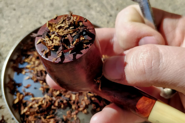 Packing Pipe Tobacco With Tamp Tool
