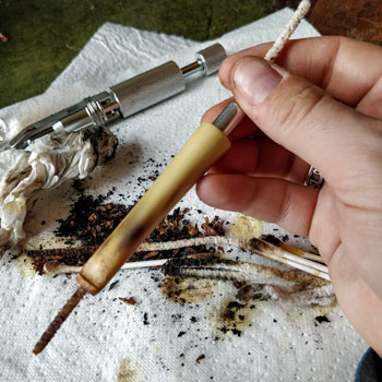 Running A Pipe Cleaner Through Stem