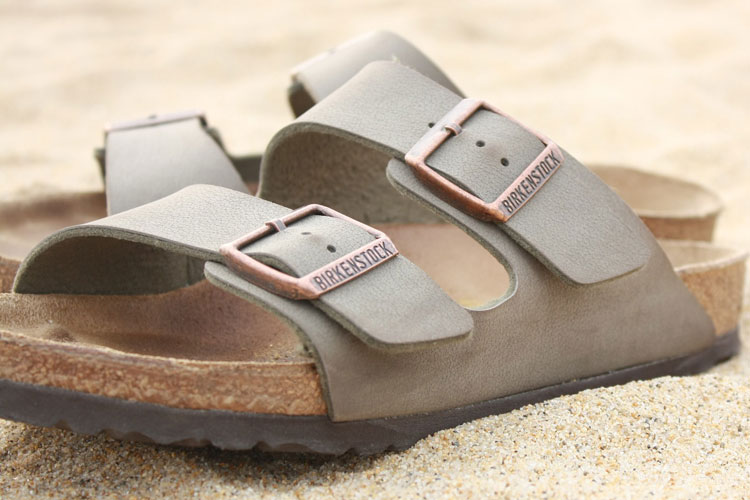 Birkenstocks On A Sandy Beach