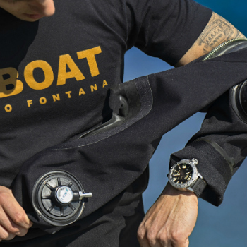 Diver In Wetsuit Wearing U-Boat Watch