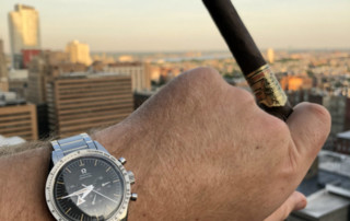 Speedmaster 57 With Cigar Sunset Background