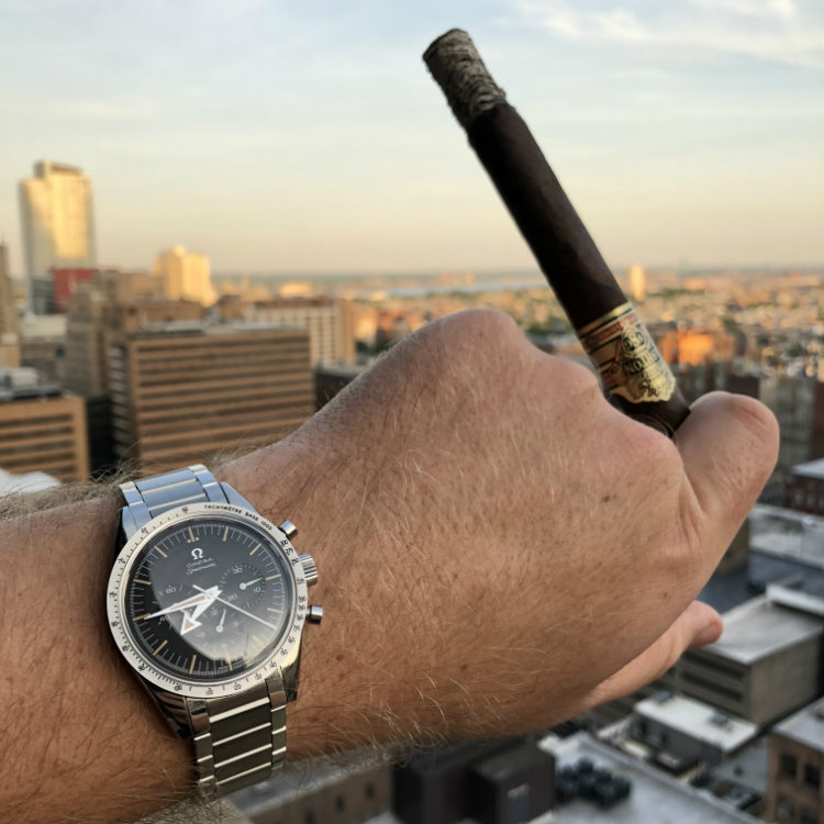 Speedmaster 57 With Cigar Sunset Background