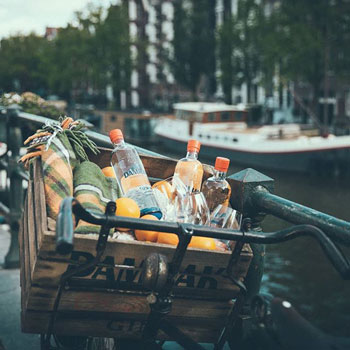 Damrak Gin Bottles On Bicycle Crate