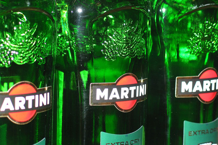 Row Of Extra Dry Martini Vermouth Bottles