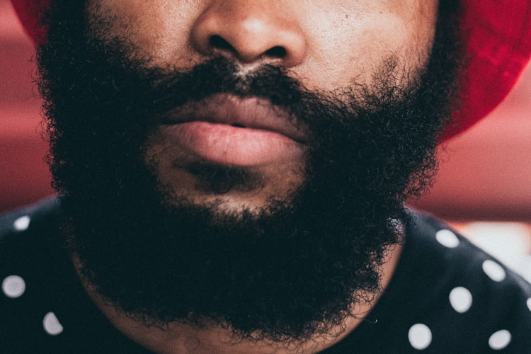 African American Man With A Garibaldi Full Beard & Natural Cheek Lines