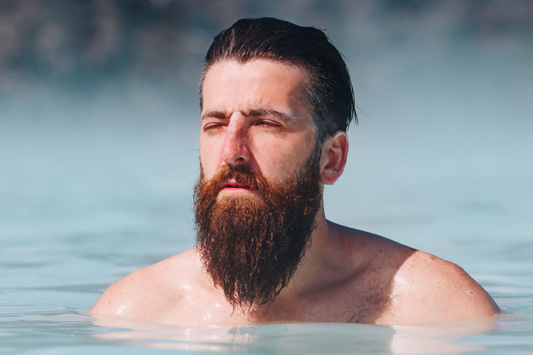 Bearded Man Swimming In Lake