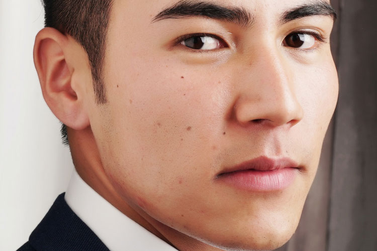 Man With Sideburns In Suit