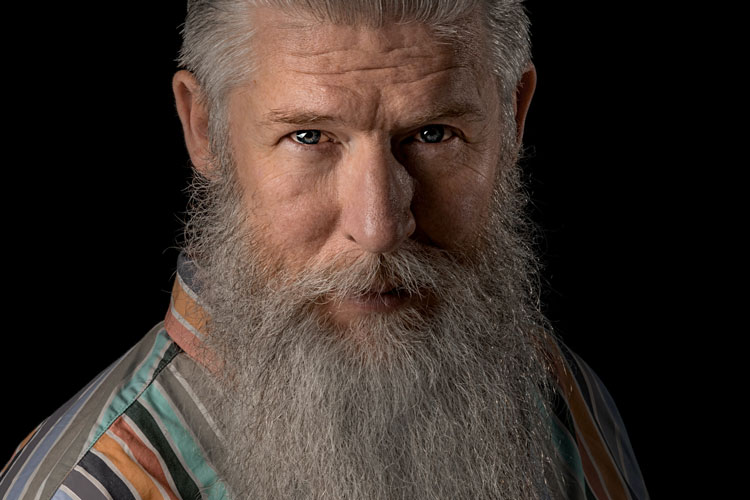 Older Man With A Long Full Beard