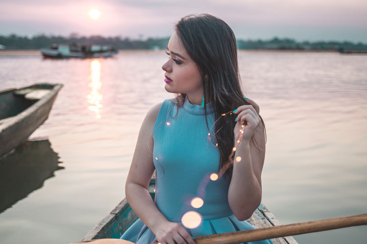 Woman In Boat Wearing Cocktail Dress