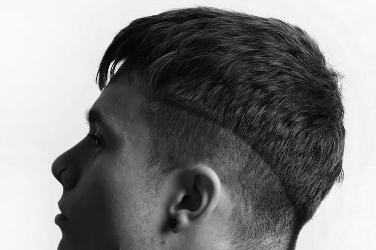 Long Caesar Haircut With Disconnected Fade