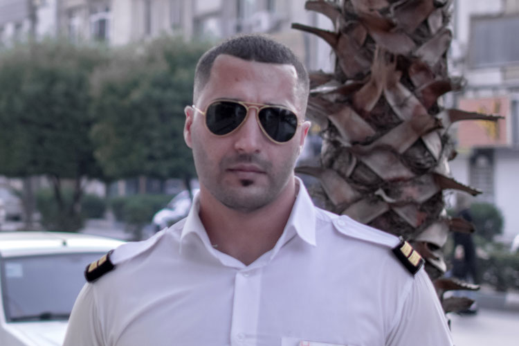 Man In Uniform With Buzz Cut