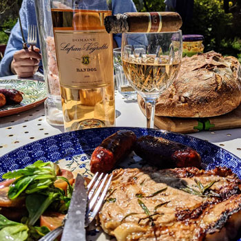 Smoking A Cigar While Eating A BBQ