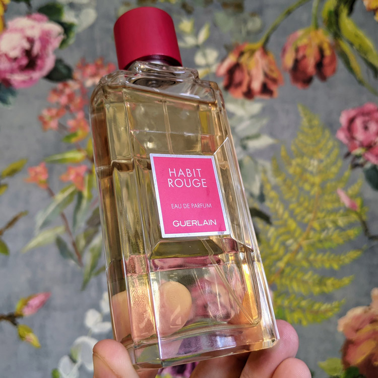 Guerlain Habit Rouge Floral Background