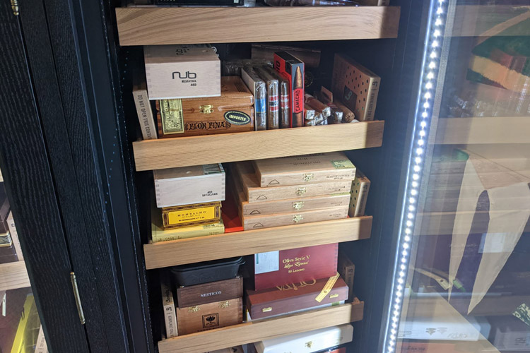 Filled Remington Cigar Cabinet Humidor Shelves