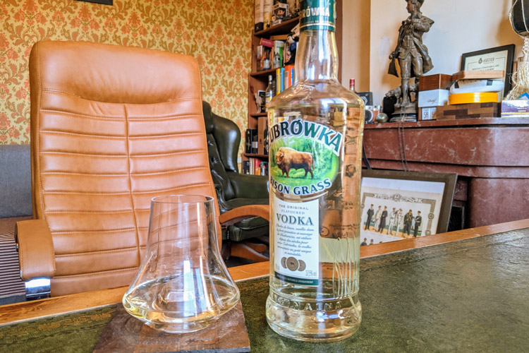 Żubrówka Bison Grass Vodka Bottle & Glass On Desk