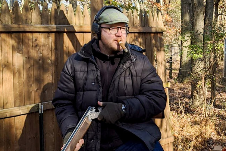 Paul Anthony Smoking A Cigar & Shotgun