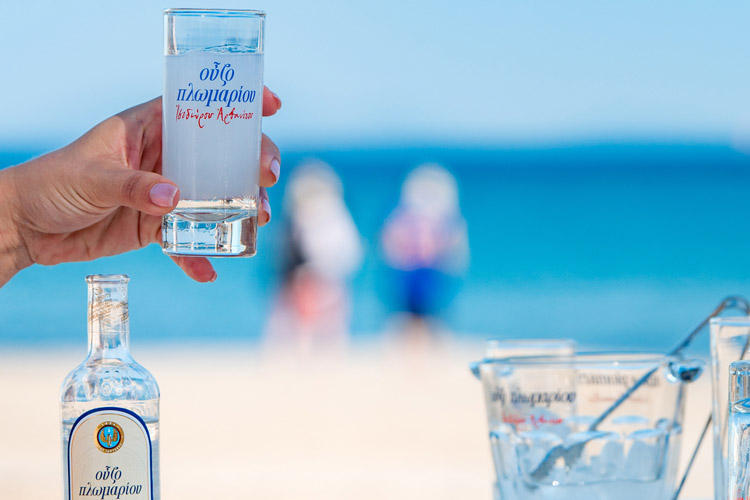 Serving Ouzo of Plomari