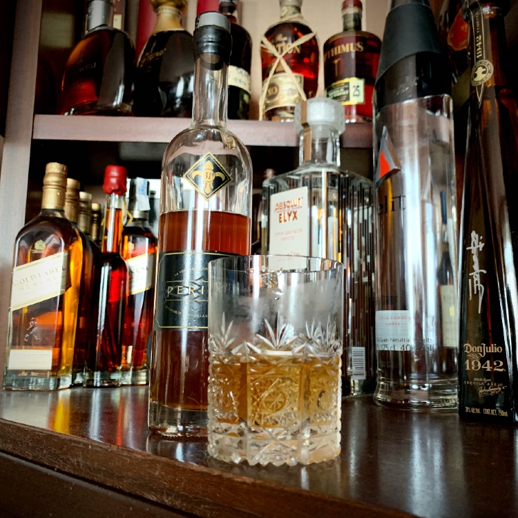 Perique-Tobacco-Liqueur-Square-Feature-bottles