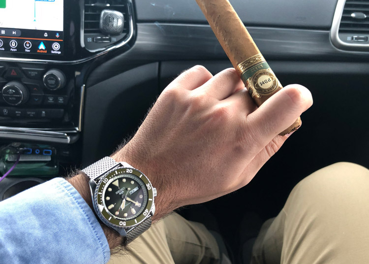 Seiko 5 Sports SRPD75 Green Dial On Wrist With Cigar