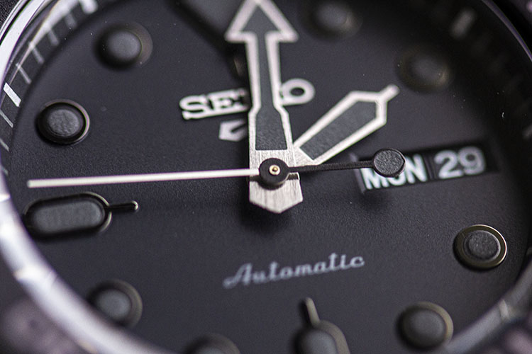 Black Dial And Brushed Hands Of Seiko 5 Sports SBSA025