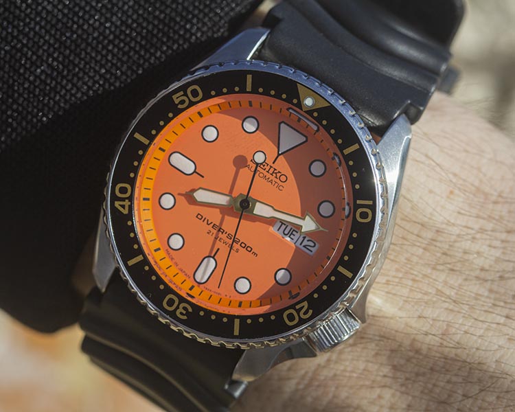 Seiko SKX011J Orange Dial Steel Dive Watch On Rubber Strap