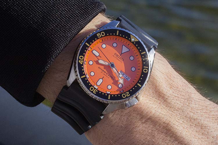 Seiko SKX011J Orange Dial Steel Dive Watch On Rubber Strap