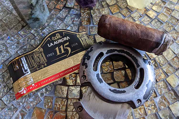 Anniversary Edition Cigar Band On La Aurora 115th And Xikar Cutter