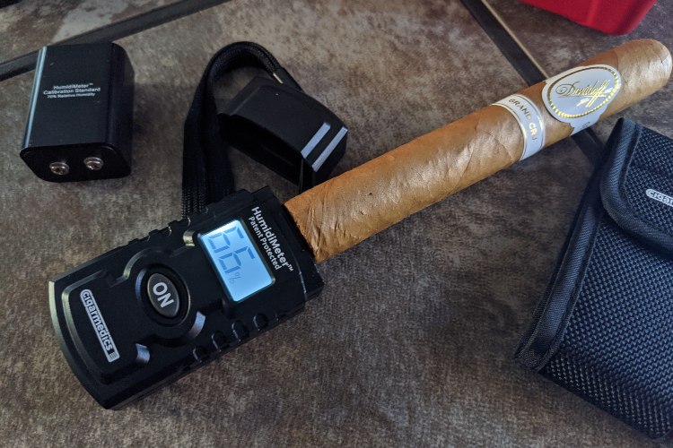 Close Up Of Using HumidiMeter To Measure RH Of Davidoff Cigar