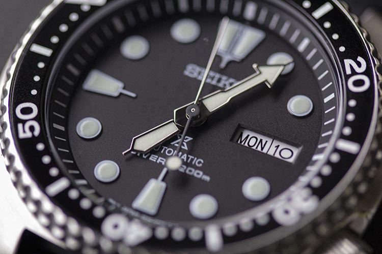 Matte Black Dial Luminous Indices And Polished Hands SRP777