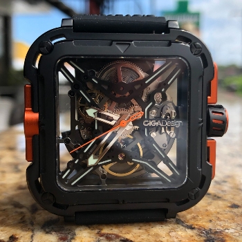 Case Details And Orange Accents On Black Watch Case CIGA Design