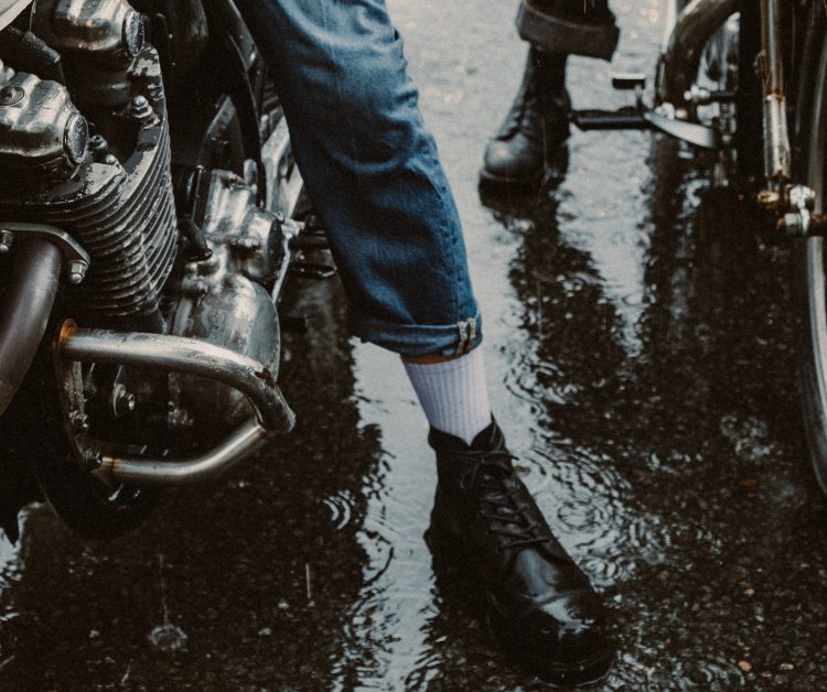 Men On Motorcycles Wearing Motorcycle Boots in Rain